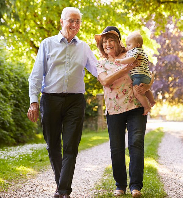 grandparents on walking path with their grandchild annuity income sparta tn